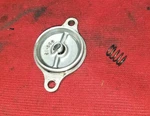 RM-Z450 Suzuki 2005 Oil Pump Cover With Spring Used. Price: $8.00.
