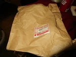 Kawasaki Oem Filter New 16097-1057. Price: $7.99.