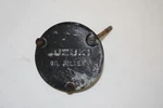 1983 - 1984 Suzuki Engine Oil Pump Filter Cover Used. Price: $10.50.